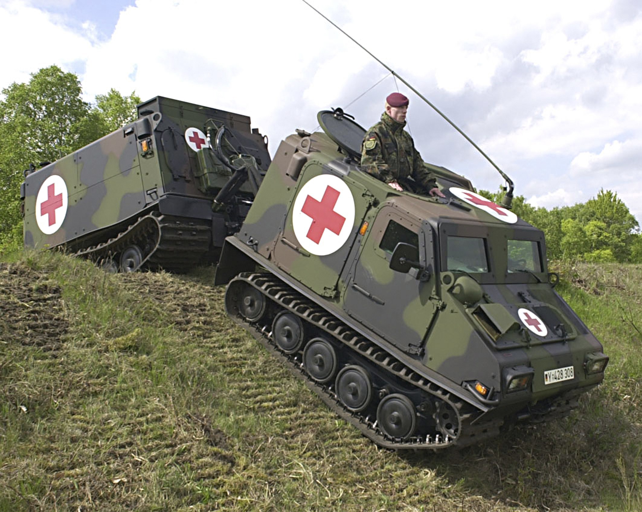 Military ambulances in field