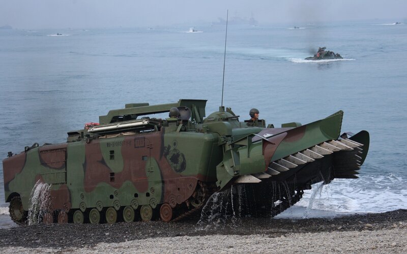 Military amphibious vehicle on beach