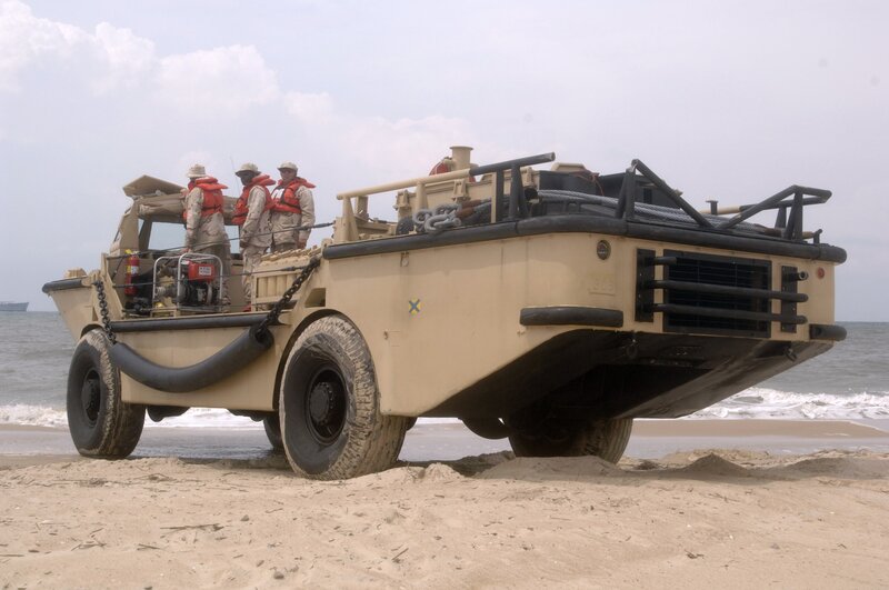 Military amphibious vehicle on beach
