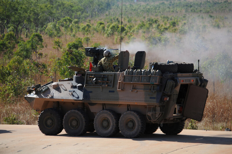 Military armored vehicle in action
