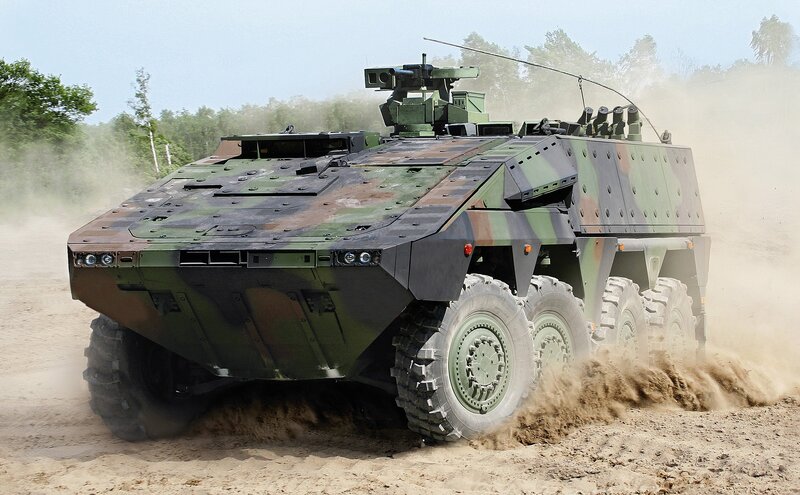 Military armored vehicle in action