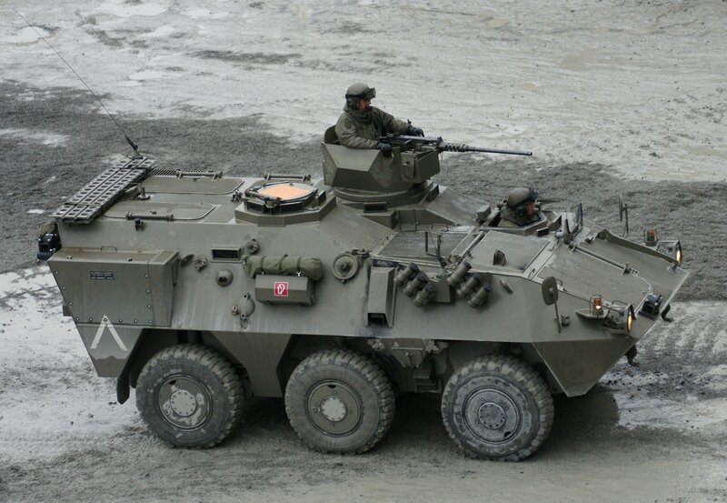 Military armored vehicle in action