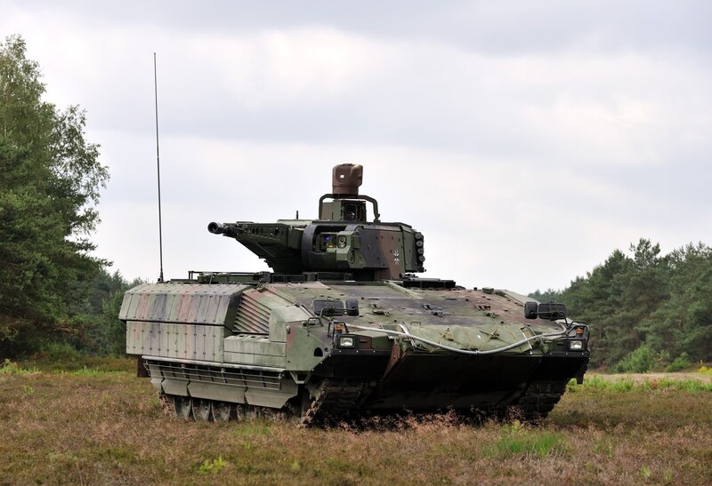 Military armored vehicle in field