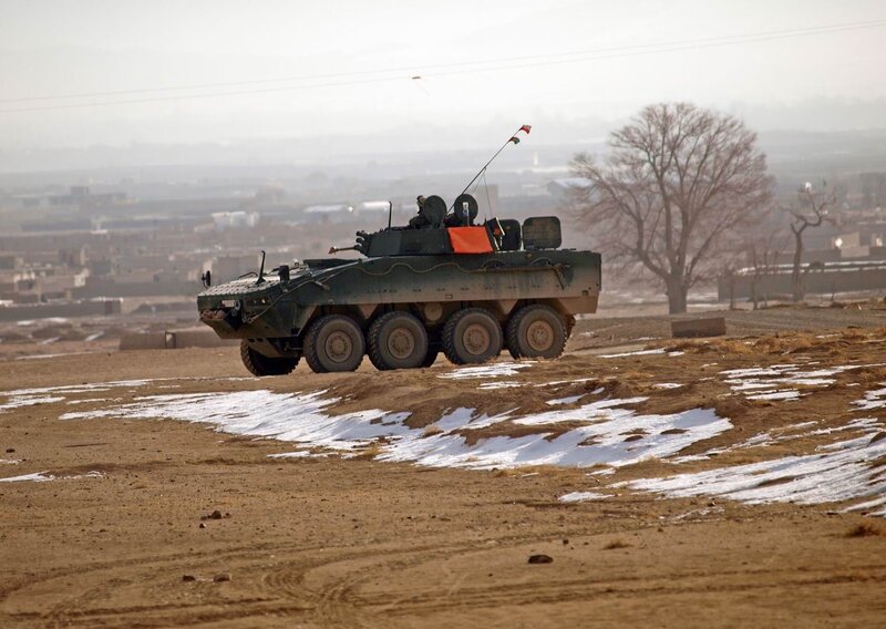 Military armored vehicle in field