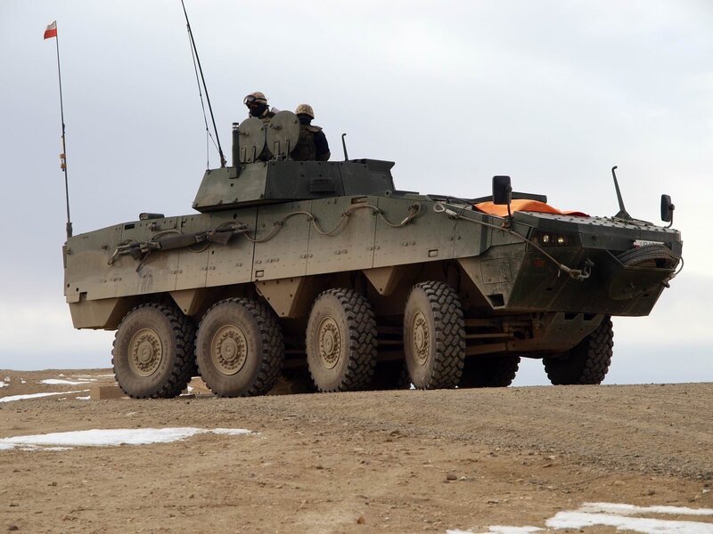 Military armored vehicle in field