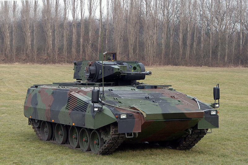 Military armored vehicle in field