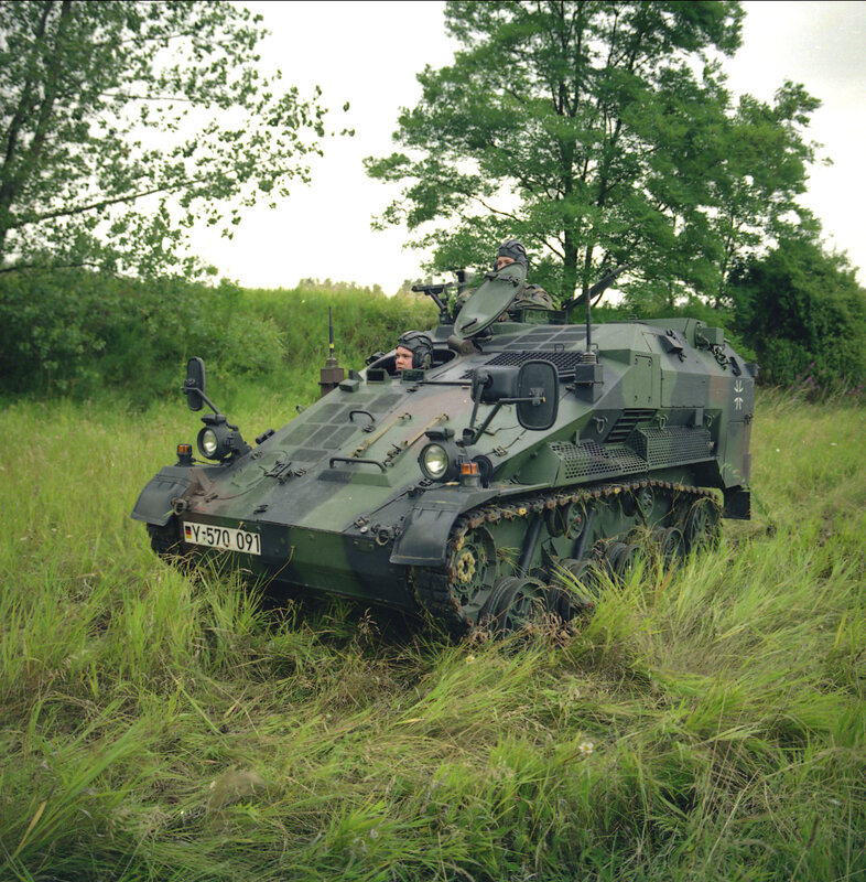 Military armored vehicle in field