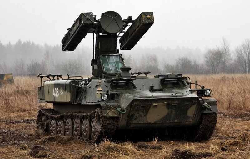 Military armored vehicle in field