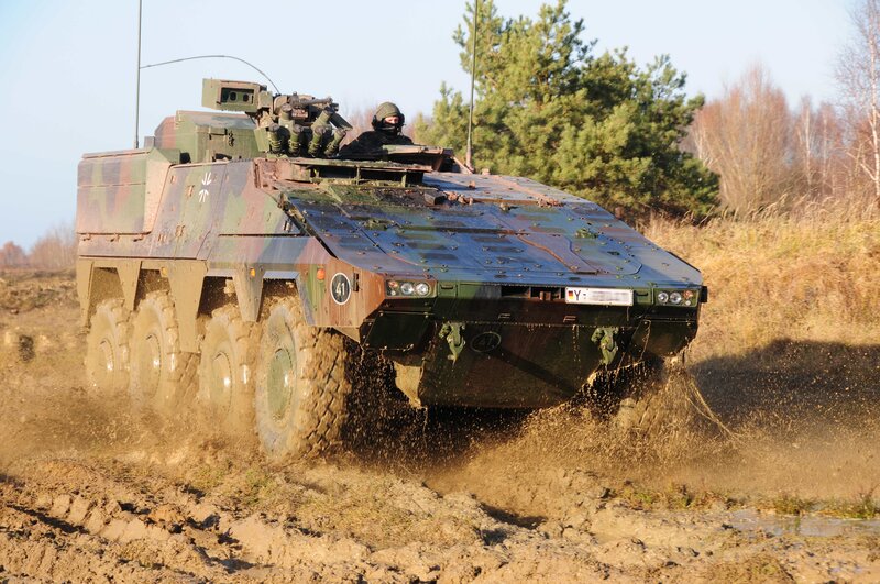 Military armored vehicle in mud