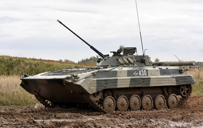 Military armored vehicle in mud