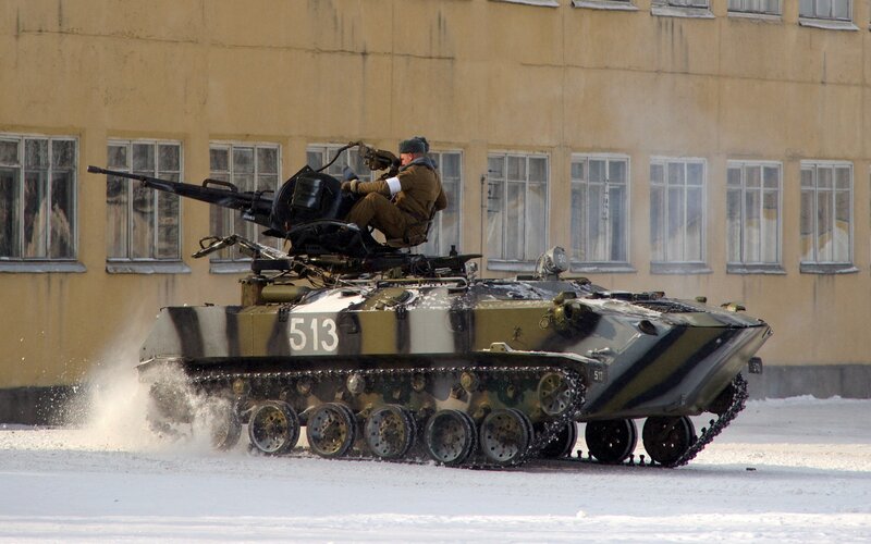 Military armored vehicle in snow