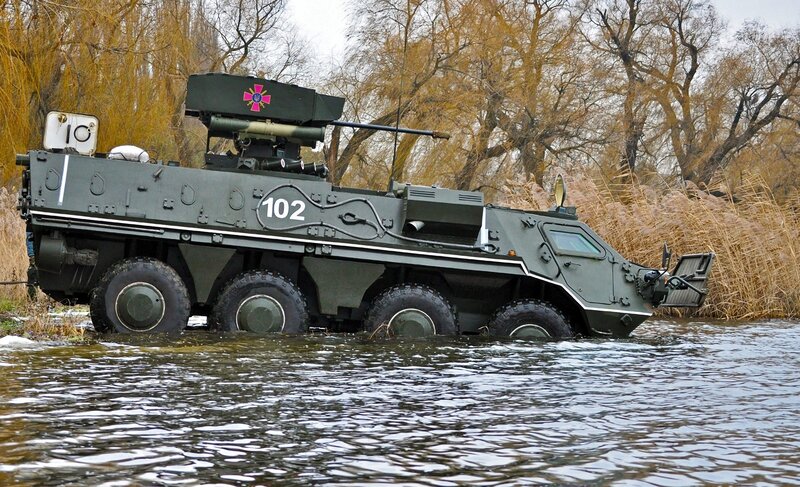 Military armored vehicle in water