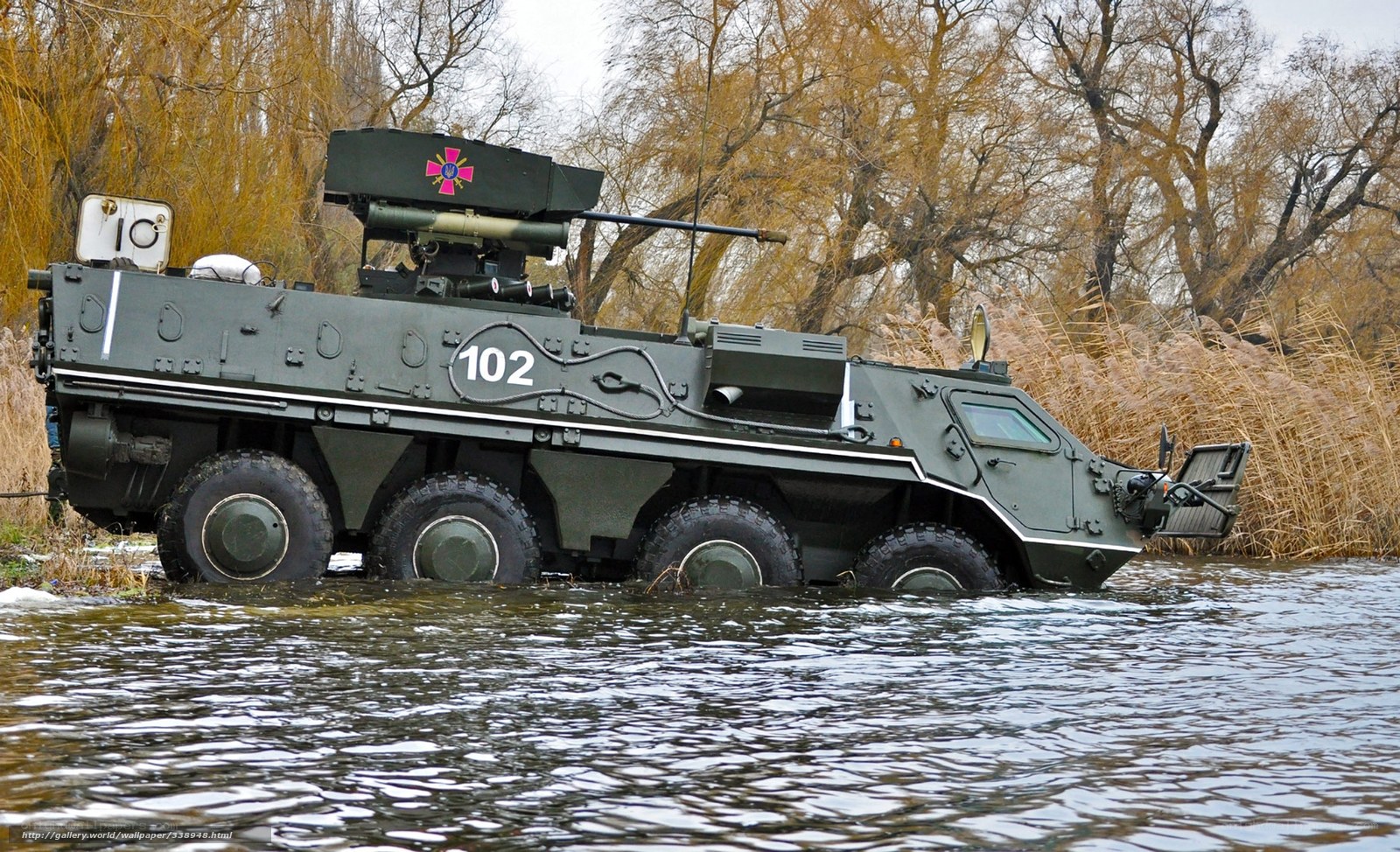 Military armored vehicle in water