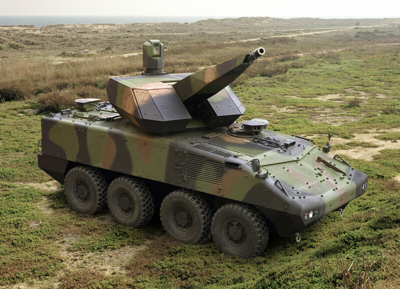 Military armored vehicle on field