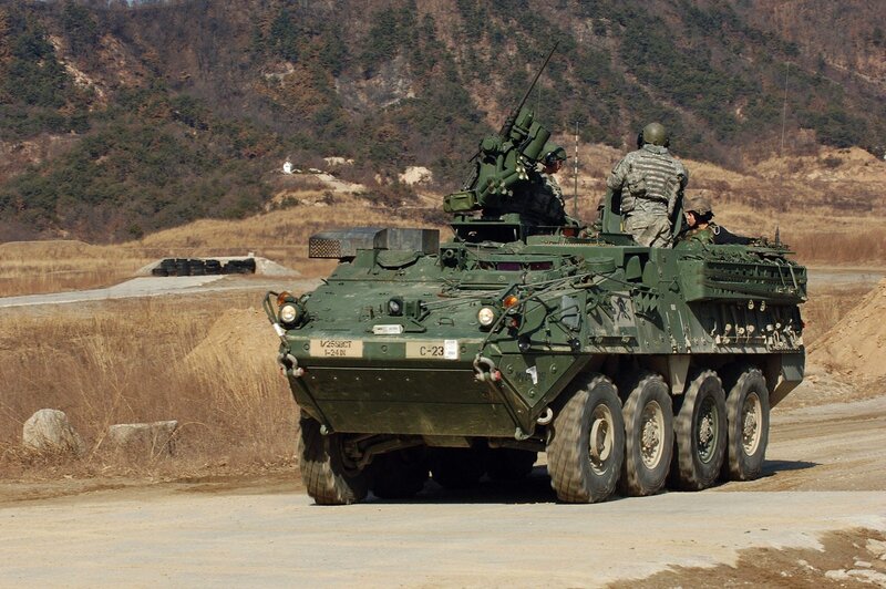 Military armored vehicle on road