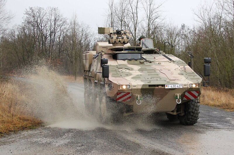 Military armored vehicle on road