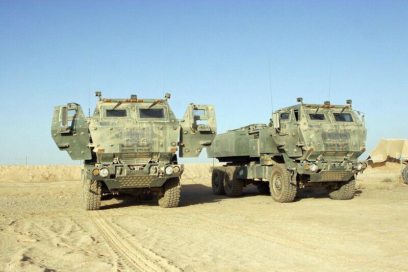 Military armored vehicles in desert
