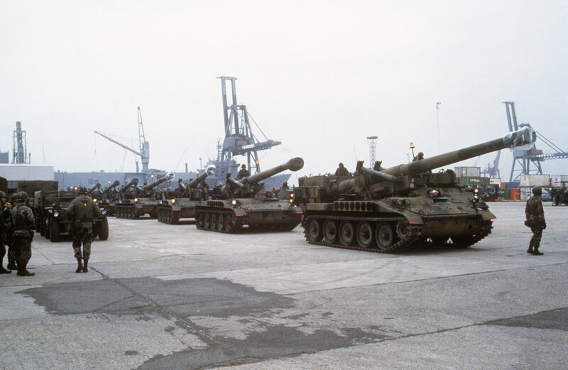 Military artillery convoy at port