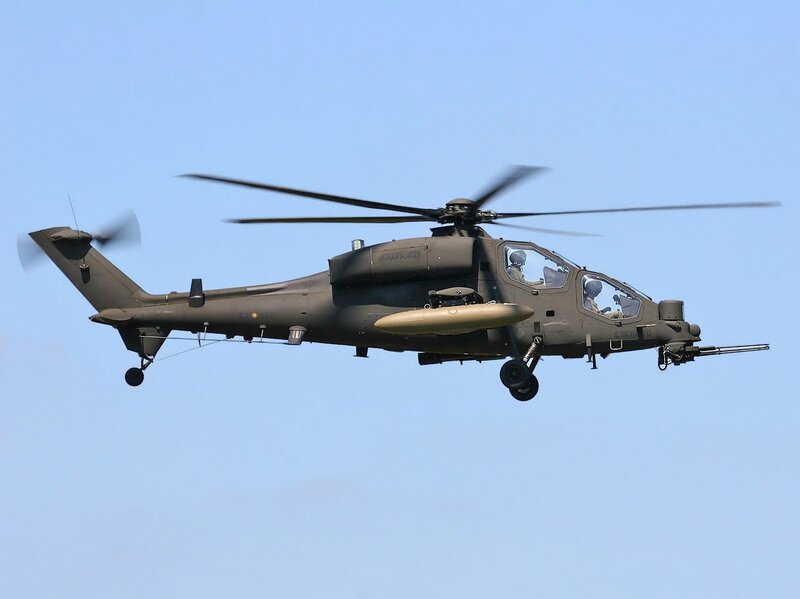 military attack helicopter in flight