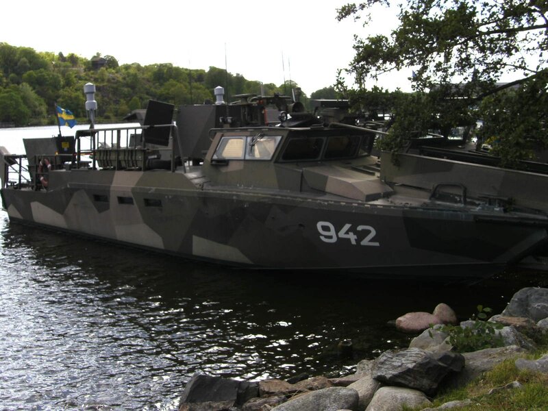 Military Boat on Water — Green