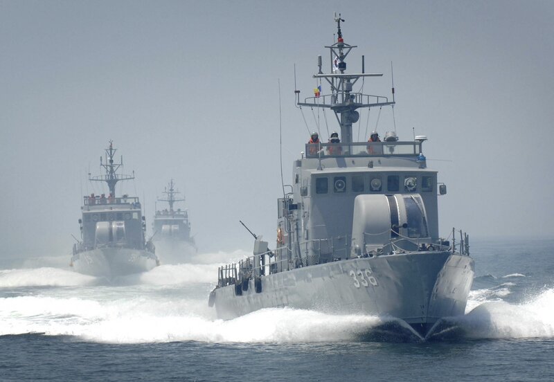 Military boats in formation
