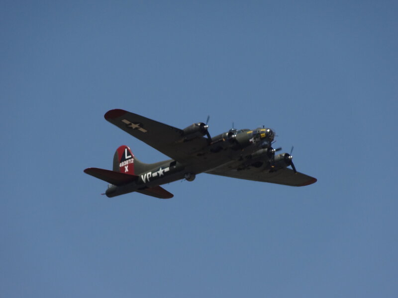 Military Bomber Aircraft — Blue, Calm, Afternoon
