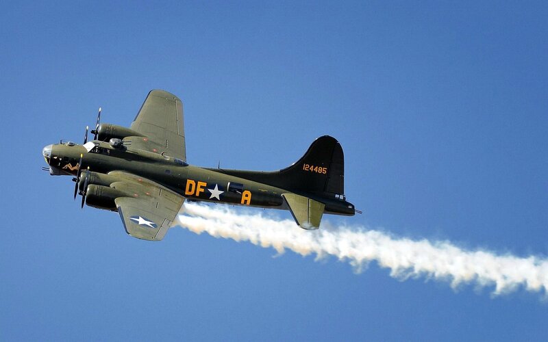 Military Bomber Aircraft — Blue, Dynamic, Afternoon