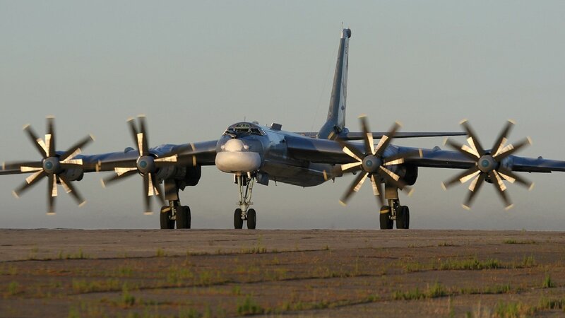 Military Bomber Aircraft — Gray, Calm, Sunset