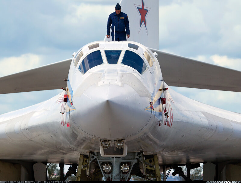Military Bomber Aircraft — White, Dramatic, Afternoon