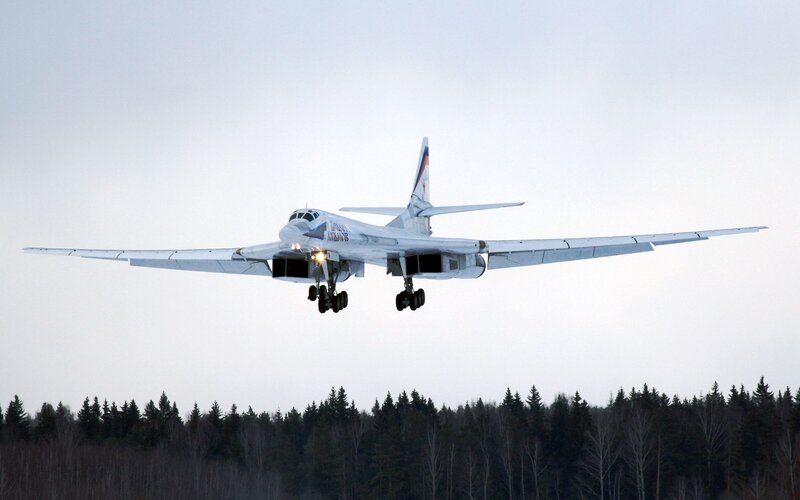 Military Bomber Aircraft — White, Dramatic
