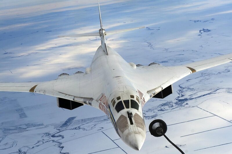 Military Bomber Aircraft — White, Dramatic, Winter
