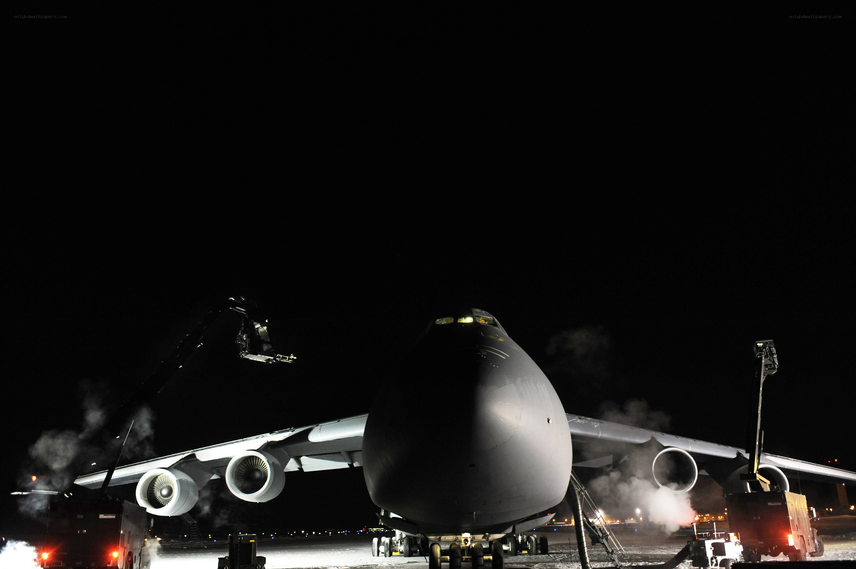 Military cargo plane at night