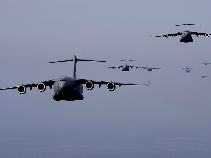 Military cargo planes in formation
