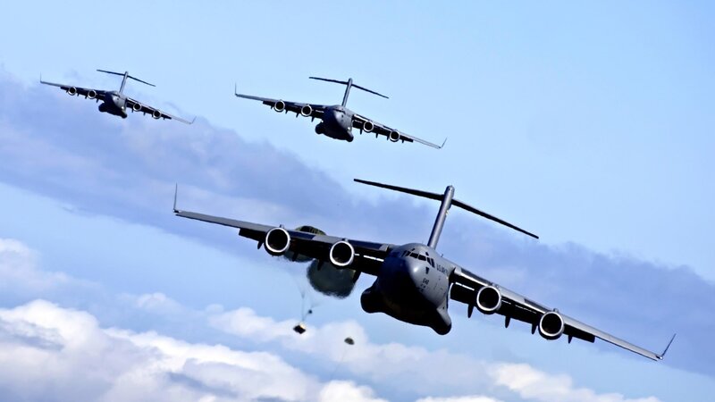 Military cargo planes in formation