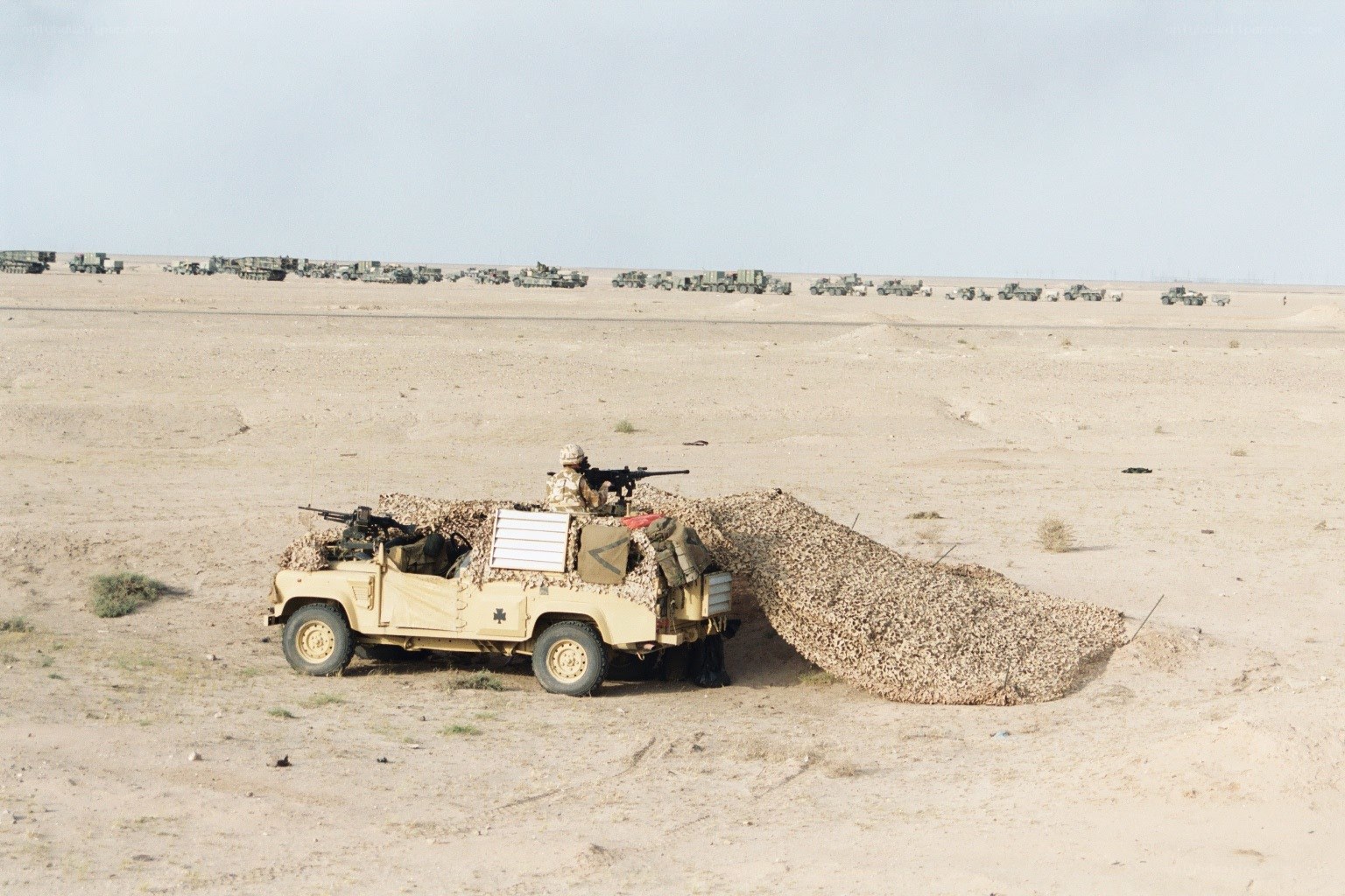 Military convoy in desert