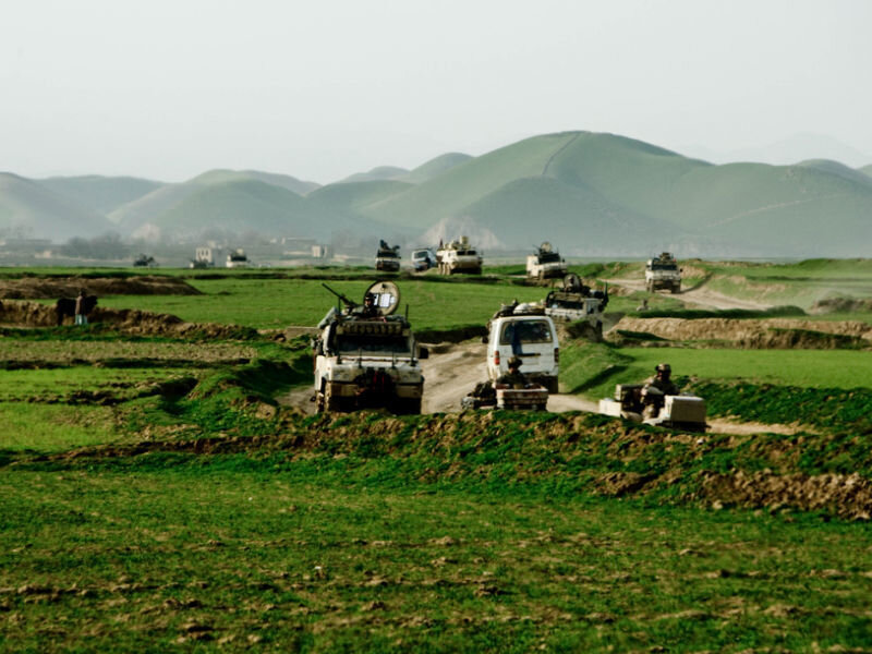 Military Convoy in Field — Green