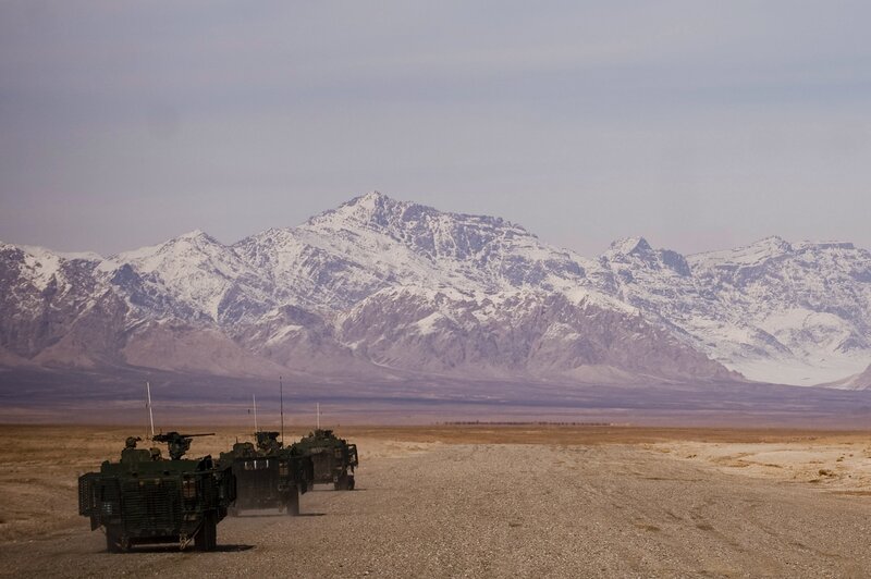 Military convoy in mountainous desert