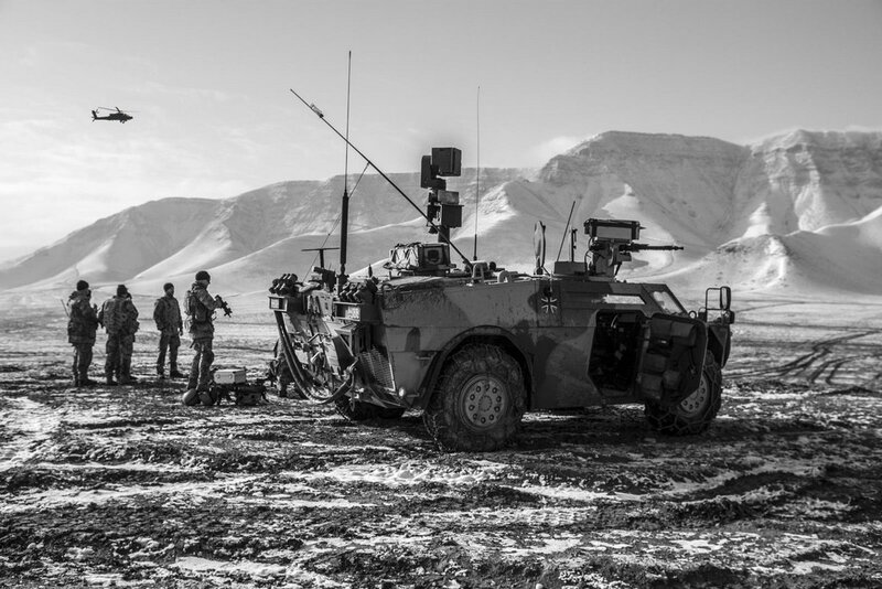 Military convoy in mountainous terrain