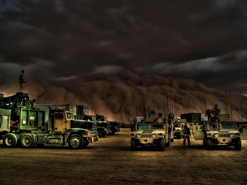 Military convoy in sandstorm