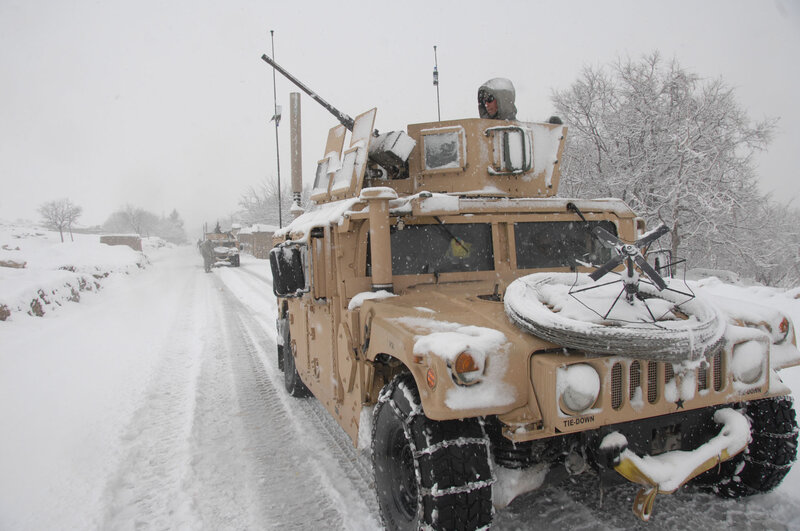 Military convoy in snowy conditions
