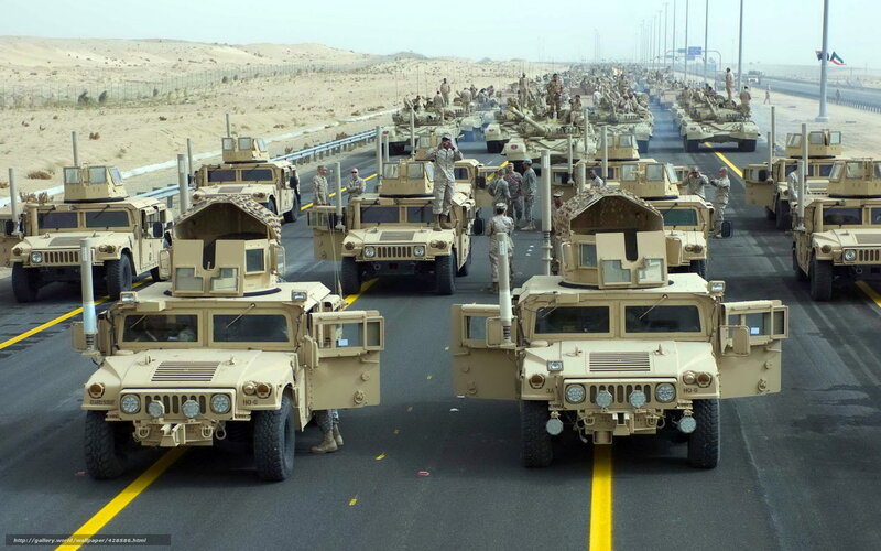 Military convoy on desert highway