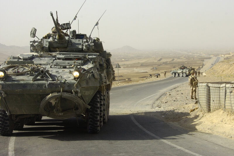 Military convoy on desert road
