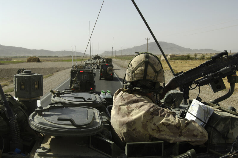 Military convoy on desert road