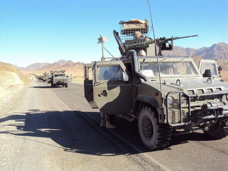 Military convoy on desert road