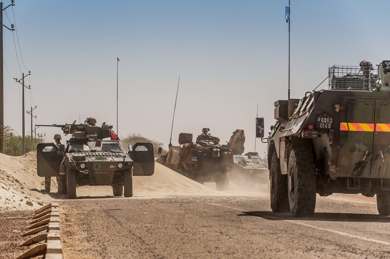 Military convoy on desert road