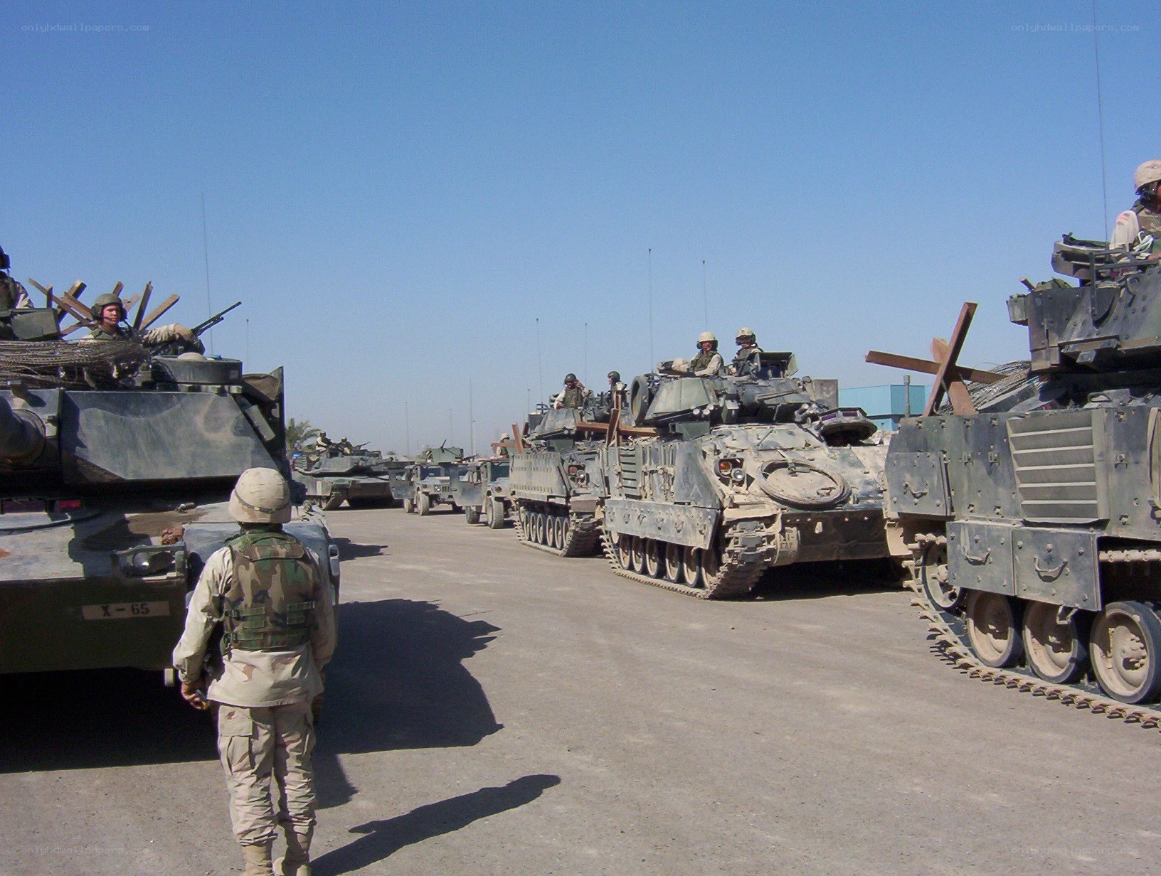 Military convoy on desert road