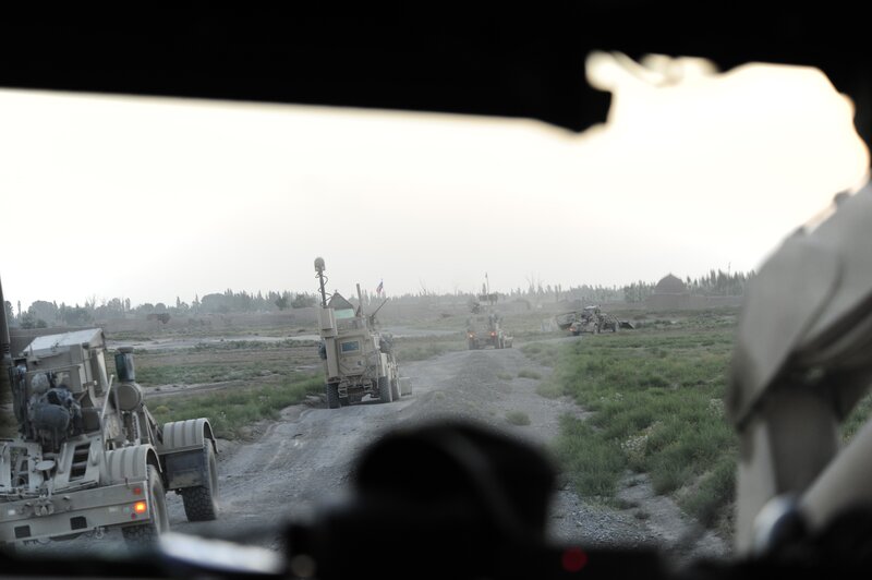 Military convoy on dirt road