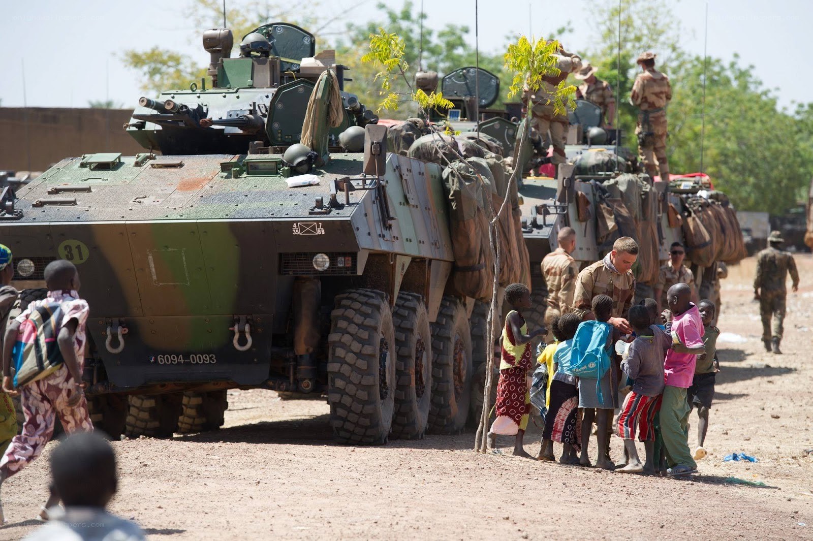 Military convoy with children