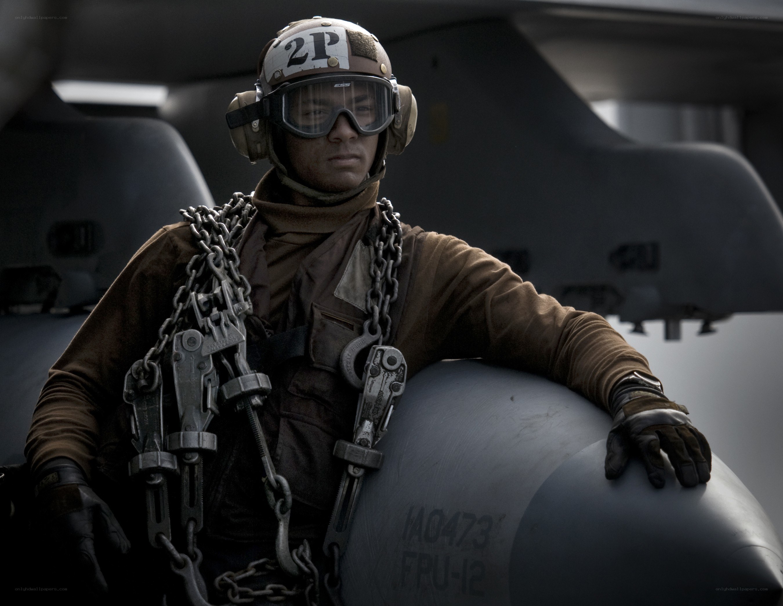 military crew member with chains