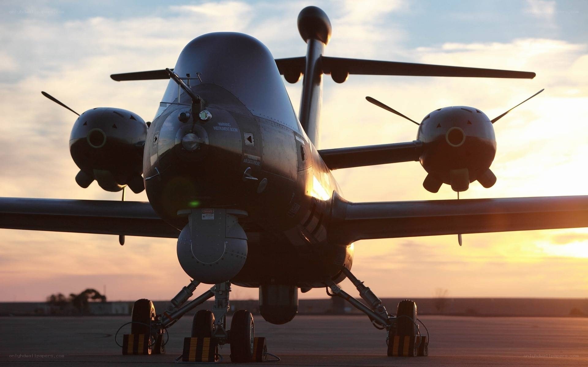 military drone at sunset